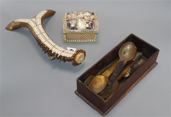 A stag antler cribbage board, a shell encrusted box and a collection of horn spoons cribbage board length 8cm